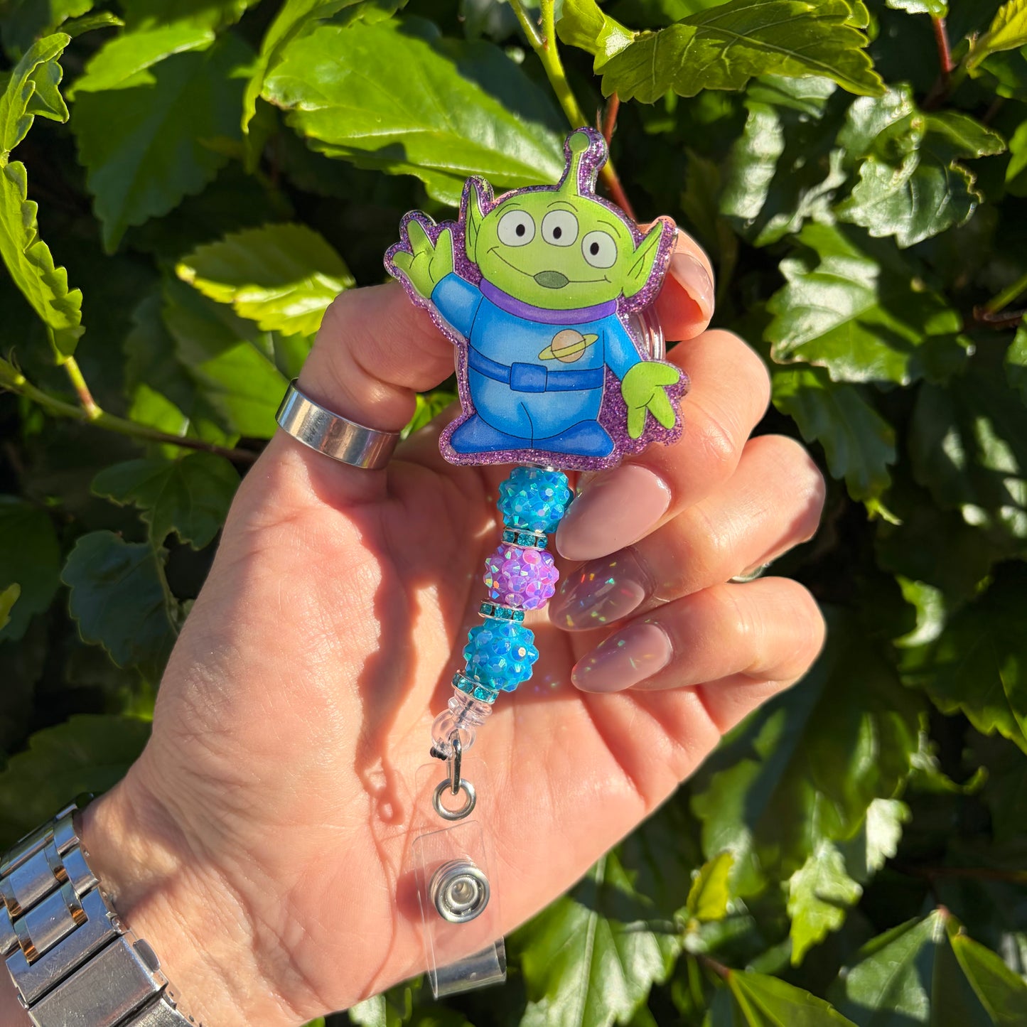 Green Alien Badge Reel